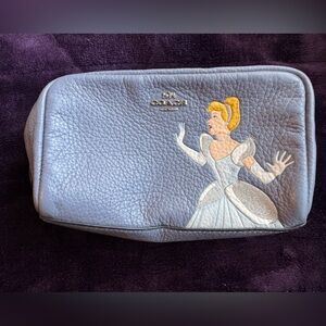 Used: Coach Cinderella cosmetic pouch